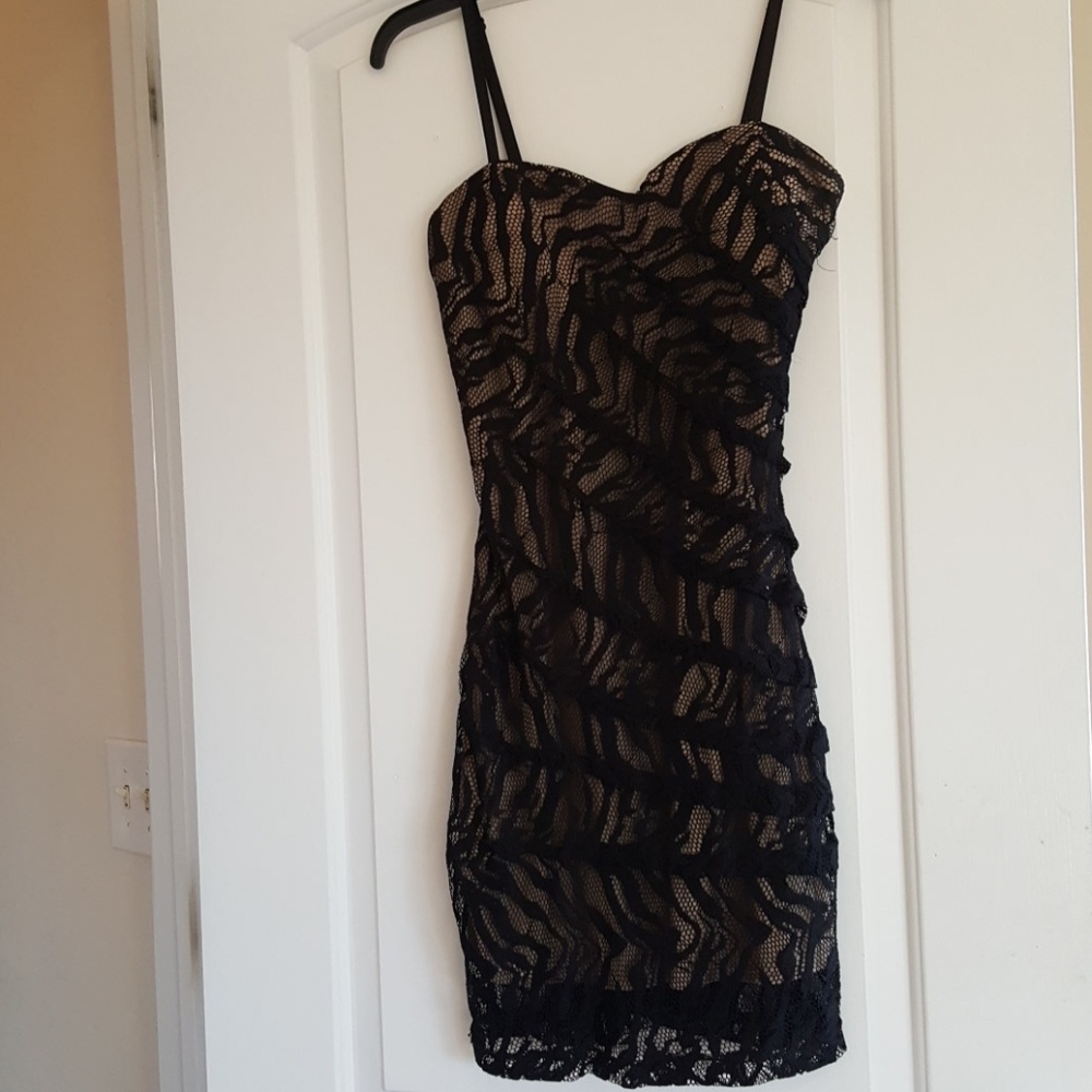 Black and flesh colored fitted dress